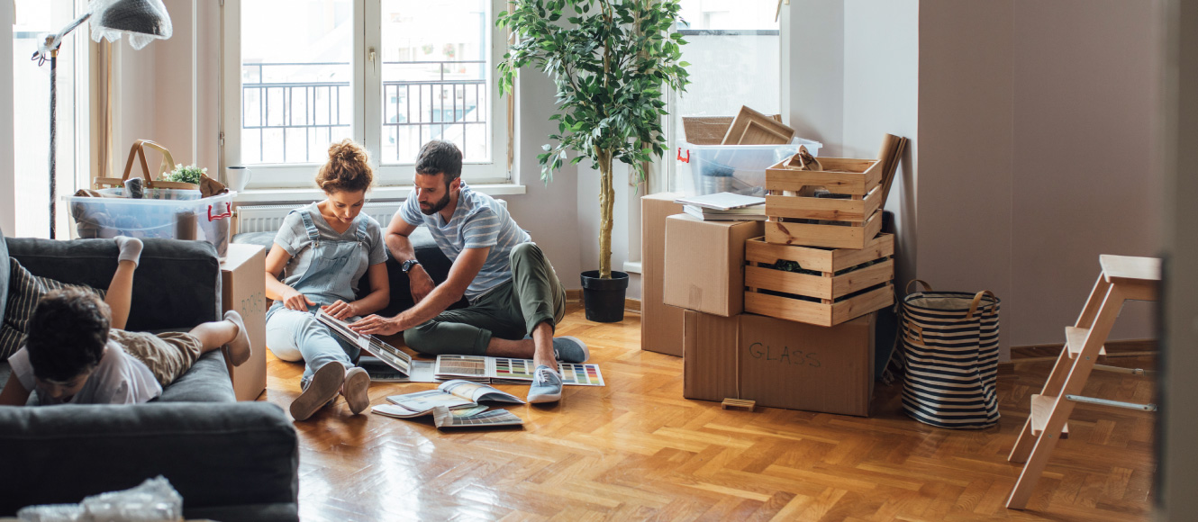 A family relaxing in their new home