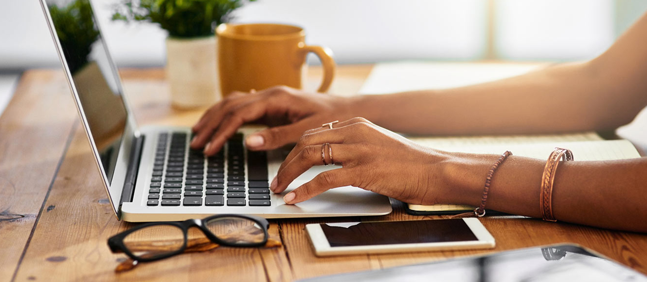 Woman using laptop.